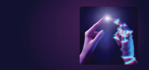 human hand pointing to finger of robot hand