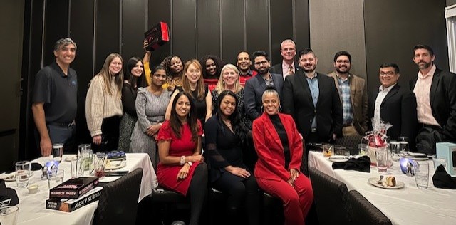 Celebrating alongside our team with a holiday party!